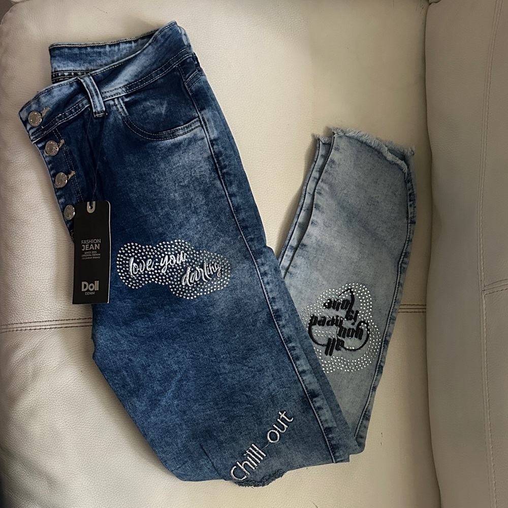 Dollcake Women's Distressed Blue Jeans with Graphic Accents